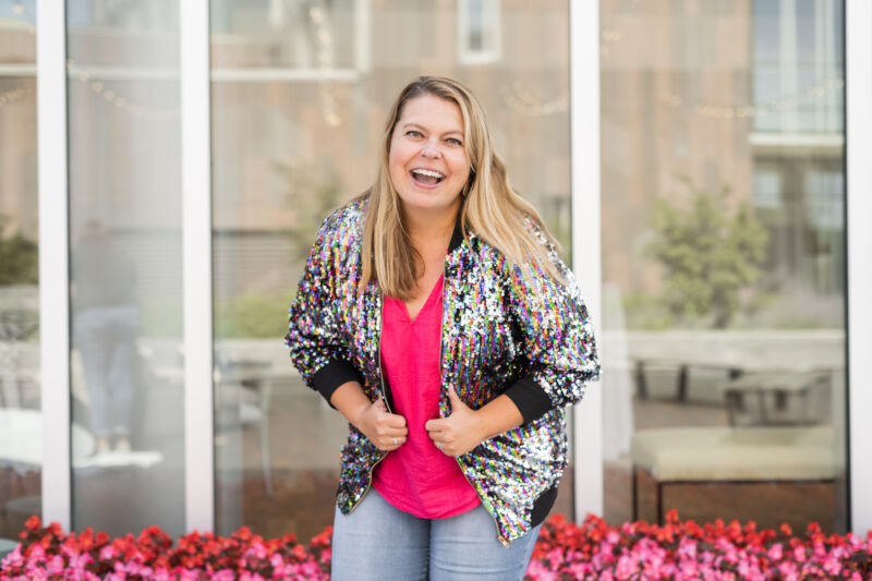 Lindsay Dollinger, founder, in pink shirt with sparkly jacket