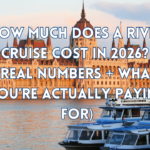 Cover for How Much Does a River Cruise Cost in 2026? (Real Numbers + What You’re Actually Paying For) with a river cruise on it